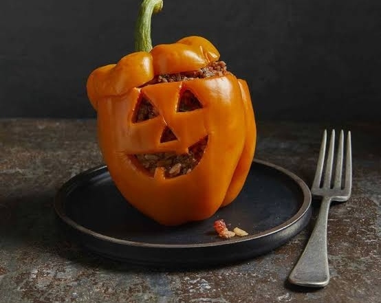 The Best Jack-o'-Lantern Stuffed Peppers Recipe Ever top view